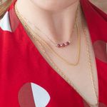 imgprincipalcolarrosetasdeouro18kcomrubisediamantes