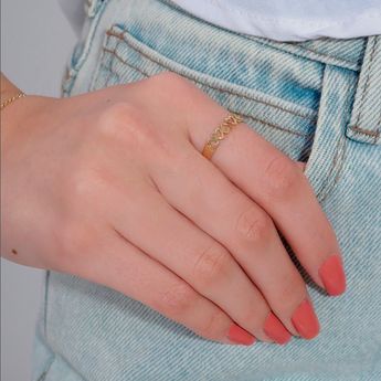 1625670a-anel-coracoes-de-ouro-18k-uso